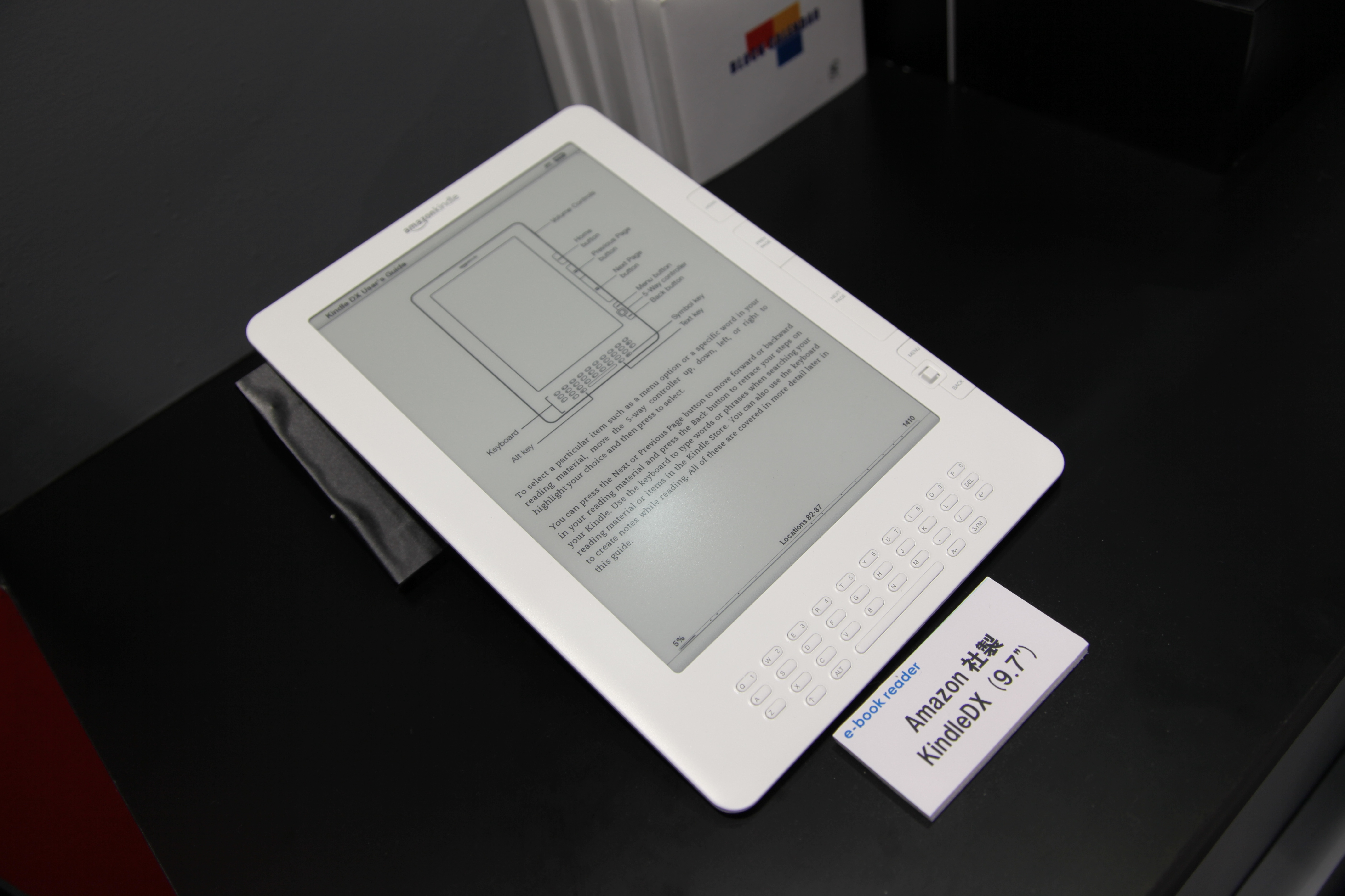 Amazon Kindle DX e-reader on a white surface