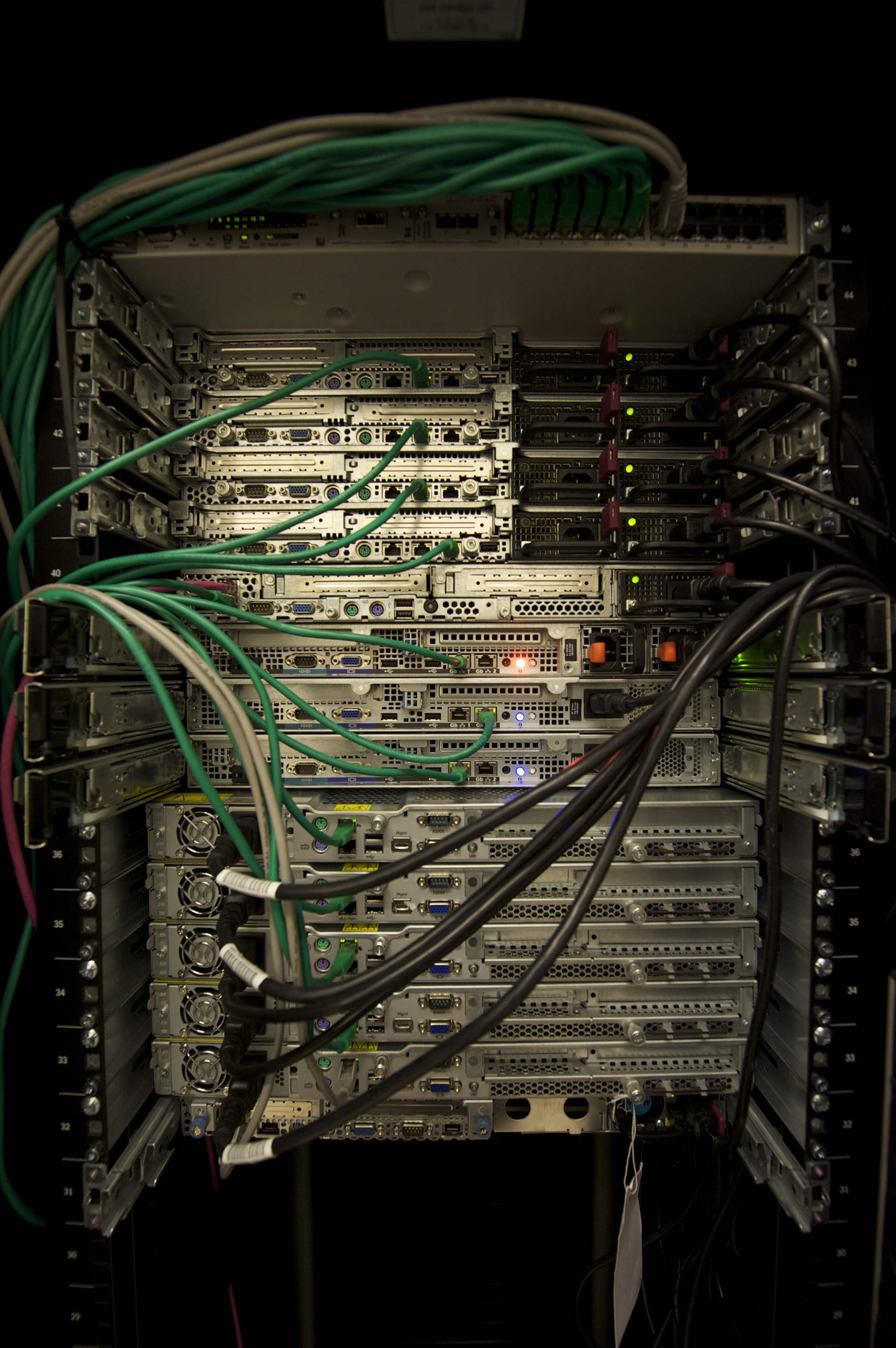 Rows of servers mounted in a data center rack